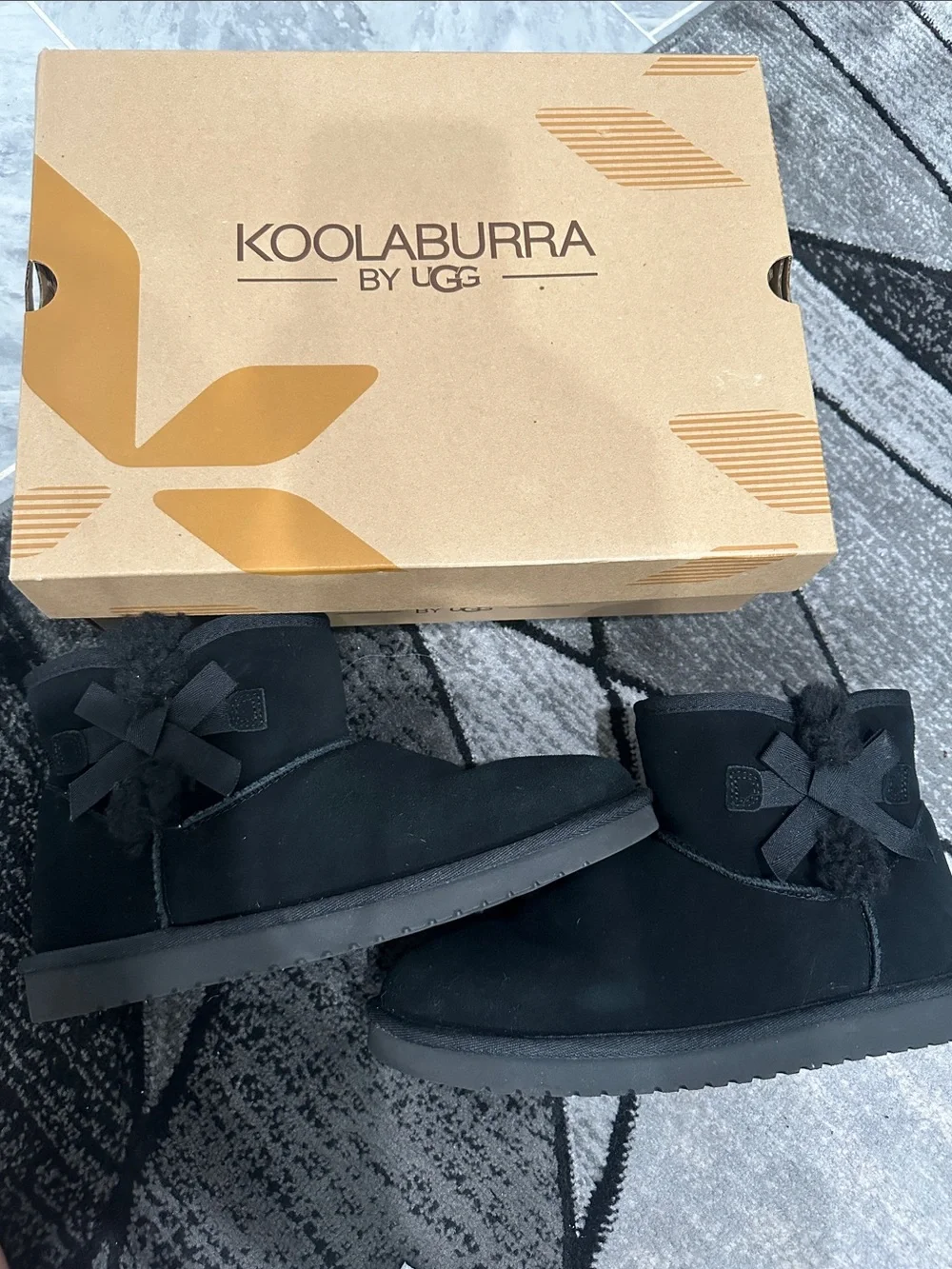 Koolaburra Black Suede Shearling Bow Ankle Boots